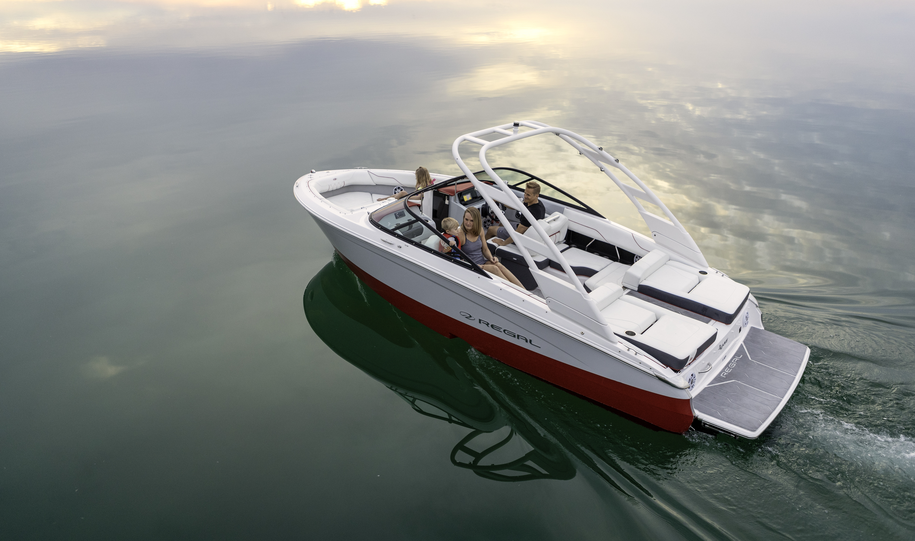 family cruising in chaparral boat
