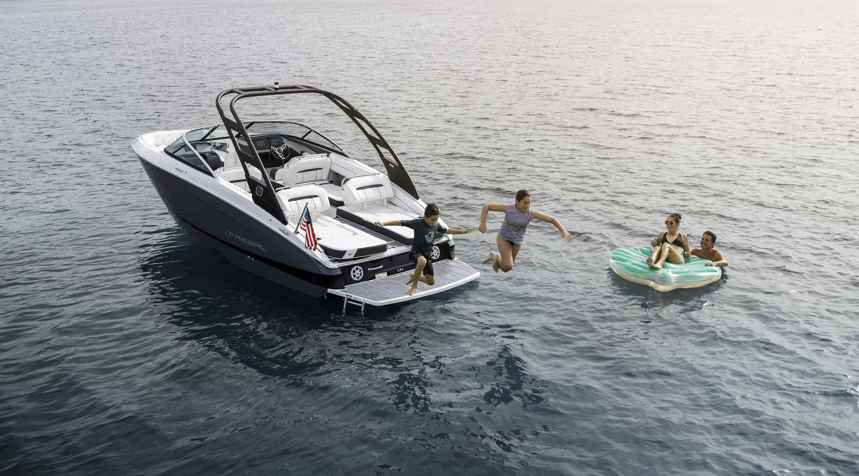 family cruising in boat